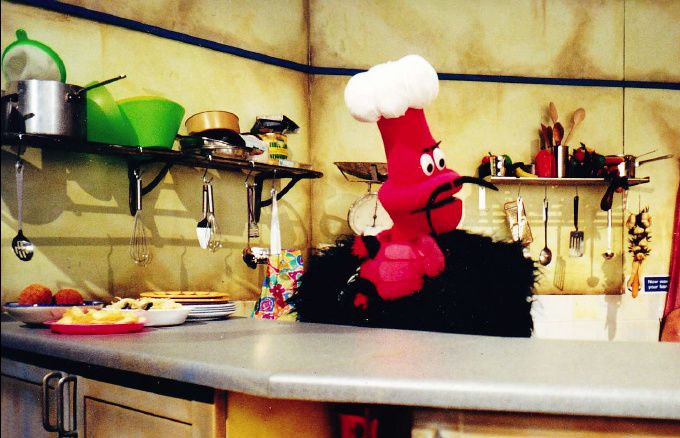 'Grub Bug' - The head chef - in the raised kitchen set