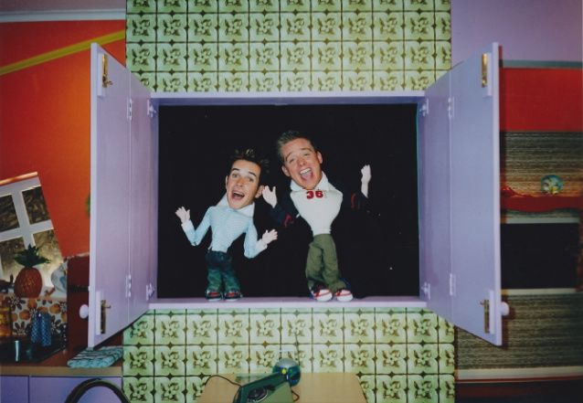 Diddy Dick and Diddy Dom in their puppet cupboard.